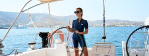 Lady standing on a yacht