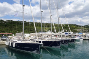 several sailing yachts in a row